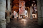 Impressie van de tentoonstelling De onzichtbaren in beeld in de Oude Kerk te Amsterdam.  A impression of the exhibition The invisble ones in focus at the Old Church in Amsterdam