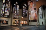 Impressie van de tentoonstelling De onzichtbaren in beeld in de Oude Kerk te Amsterdam.  A impression of the exhibition The invisble ones in focus at the Old Church in Amsterdam