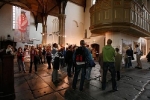 Impressie van de tentoonstelling De onzichtbaren in beeld in de Oude Kerk te Amsterdam.  A impression of the exhibition The invisble ones in focus at the Old Church in Amsterdam