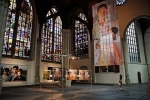 Impressie van de tentoonstelling De onzichtbaren in beeld in de Oude Kerk te Amsterdam.  A impression of the exhibition The invisble ones in focus at the Old Church in Amsterdam